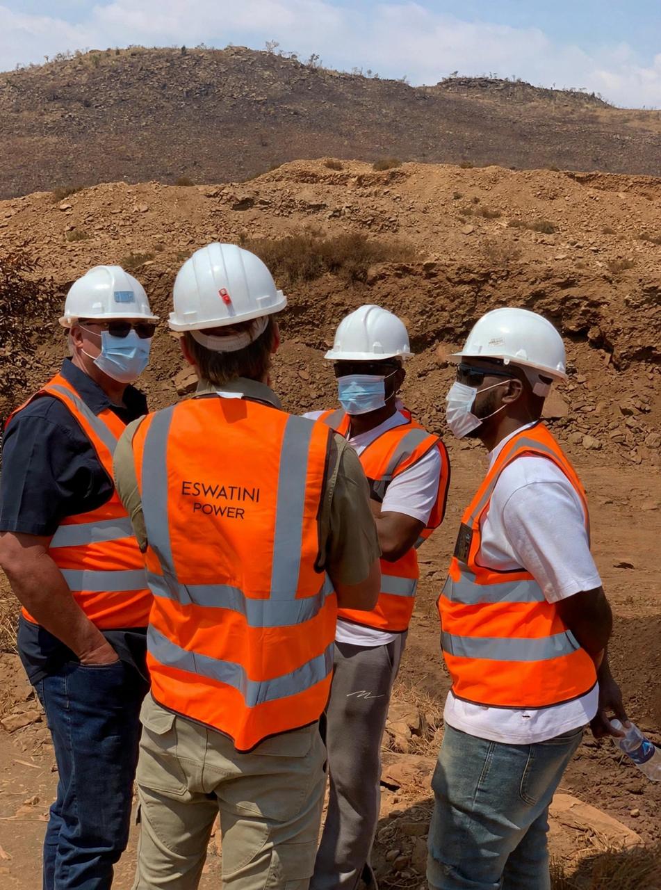 The Eswatini Power Resources team in hard hats and high-visibility vests on a mine site